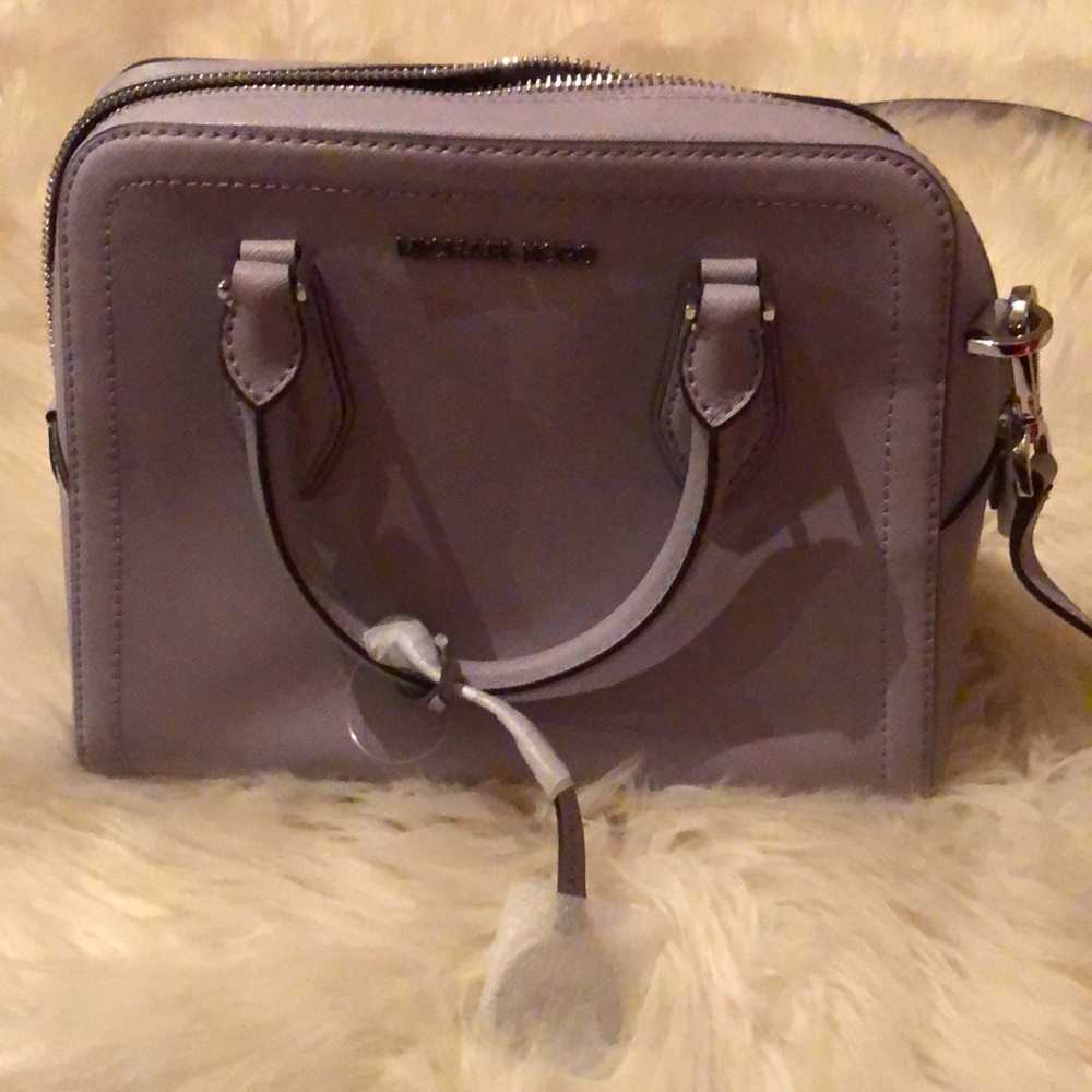 A new Michael kors croos body